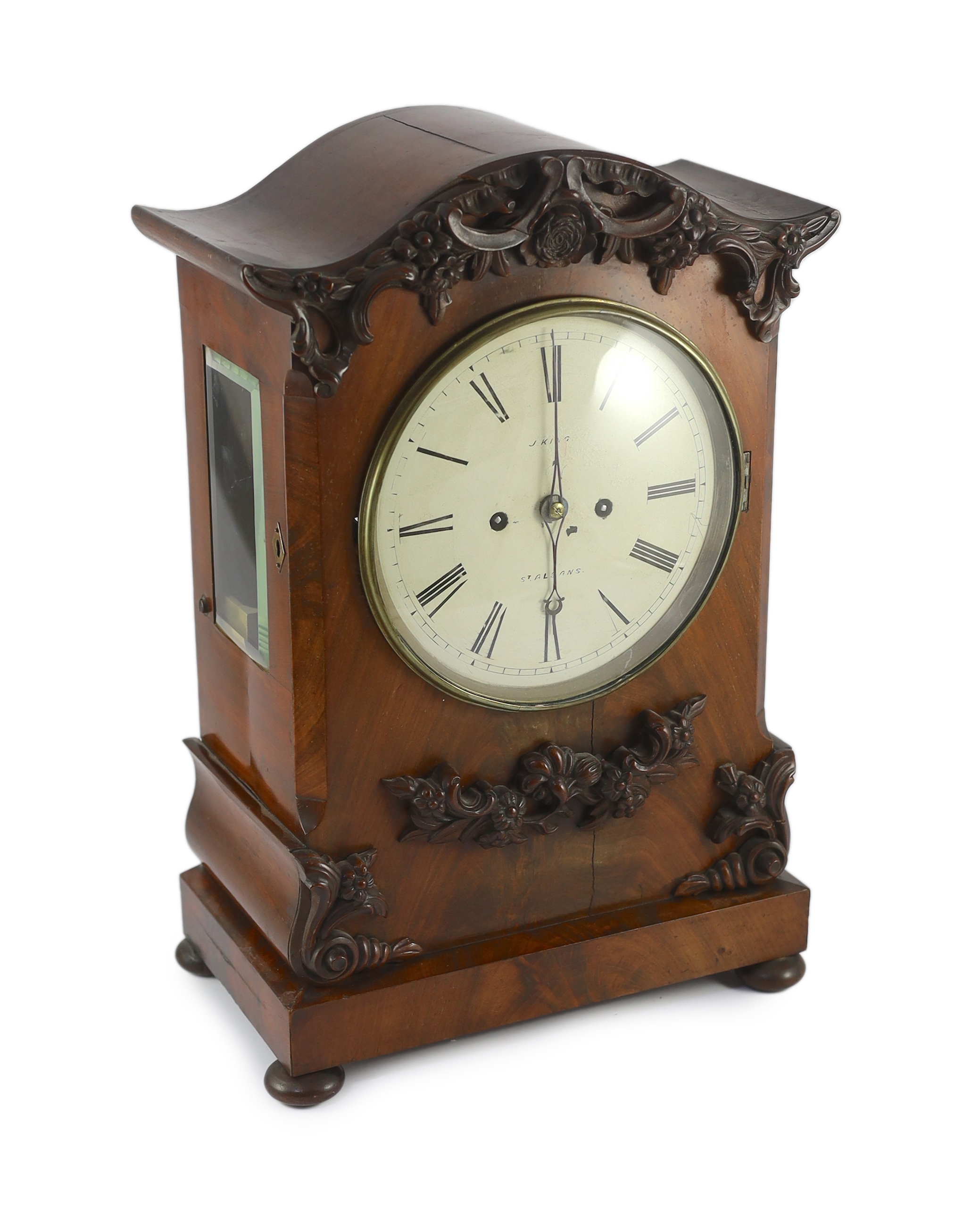J. King of St Albans. A William IV mahogany bracket clock, in architectural case with flower and scroll appliqué motifs and painted Roman dial, unsigned twin fusee movement with anchor escapement striking on a bell, 33cm
